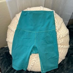 These are lululemon biker shorts. they are hardly worn with the tag still inside